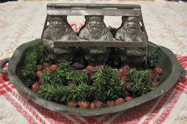 A pewter Santa Candy Mold