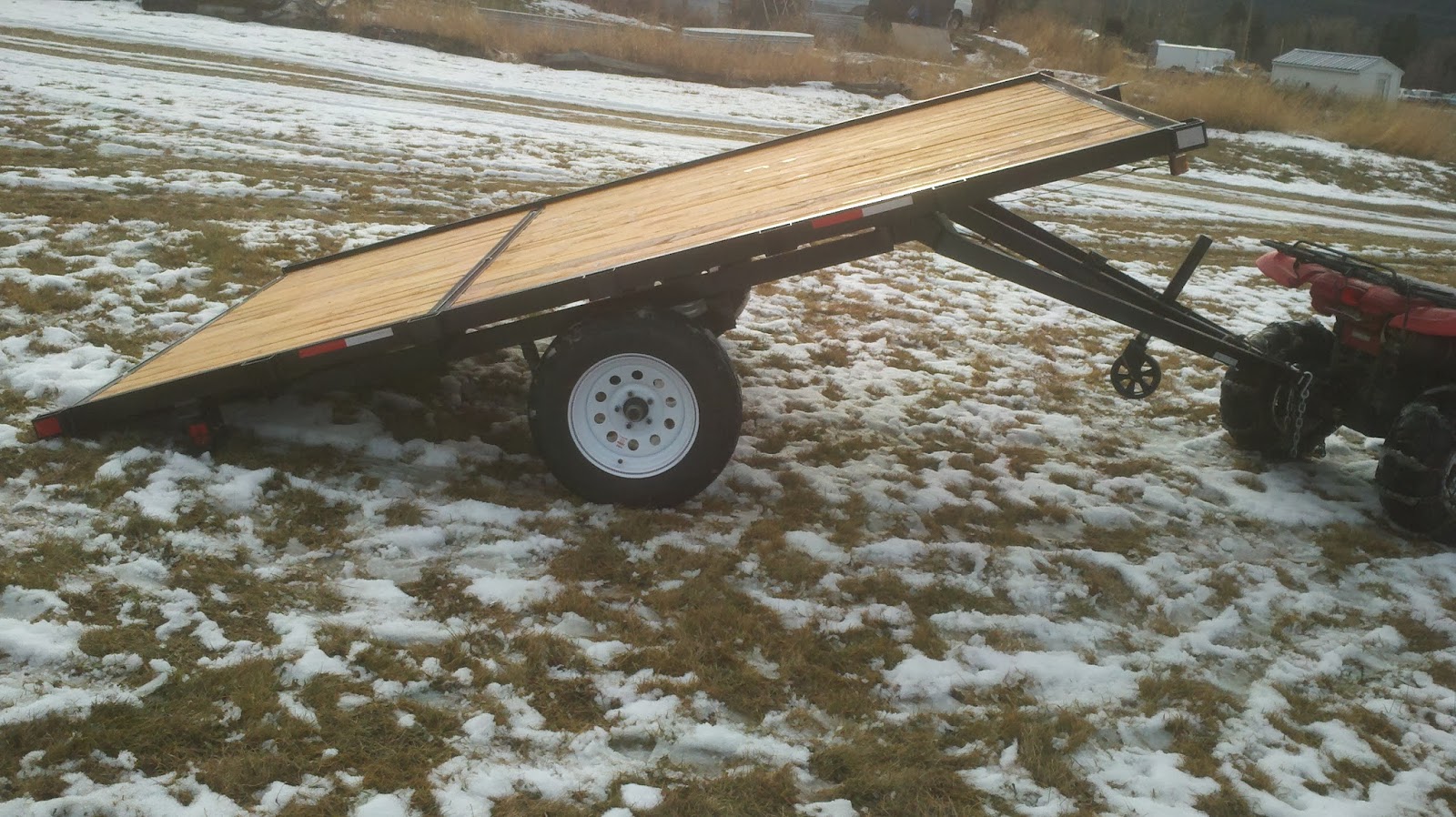 Trailers for sale Montana 8x12 snowmobile tilt trailer 15 inch tires