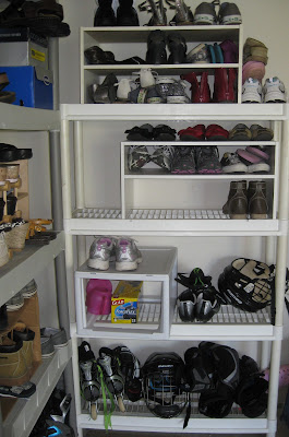 plastic shelf with shoes organized on them