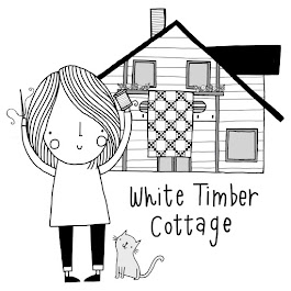 White Timber Cottage