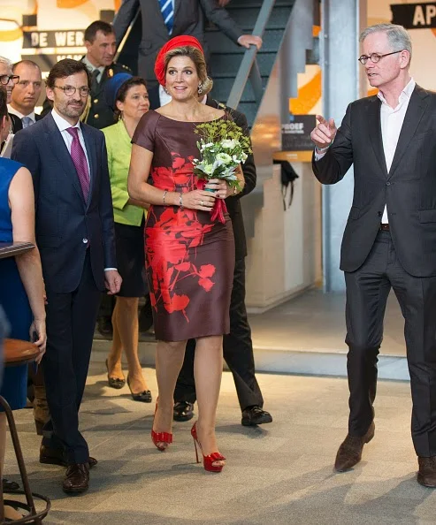 L-R) Hans de Jong, Queen Maxima of The Netherlands and Hans Schroder attend the opening of the new Markthal on 01.10.2014 in Rotterdam, Netherlands. The horseshoe-shaped arch is the first indoor fresh food market in The Netherlands while its walls and roof are 228 appartments