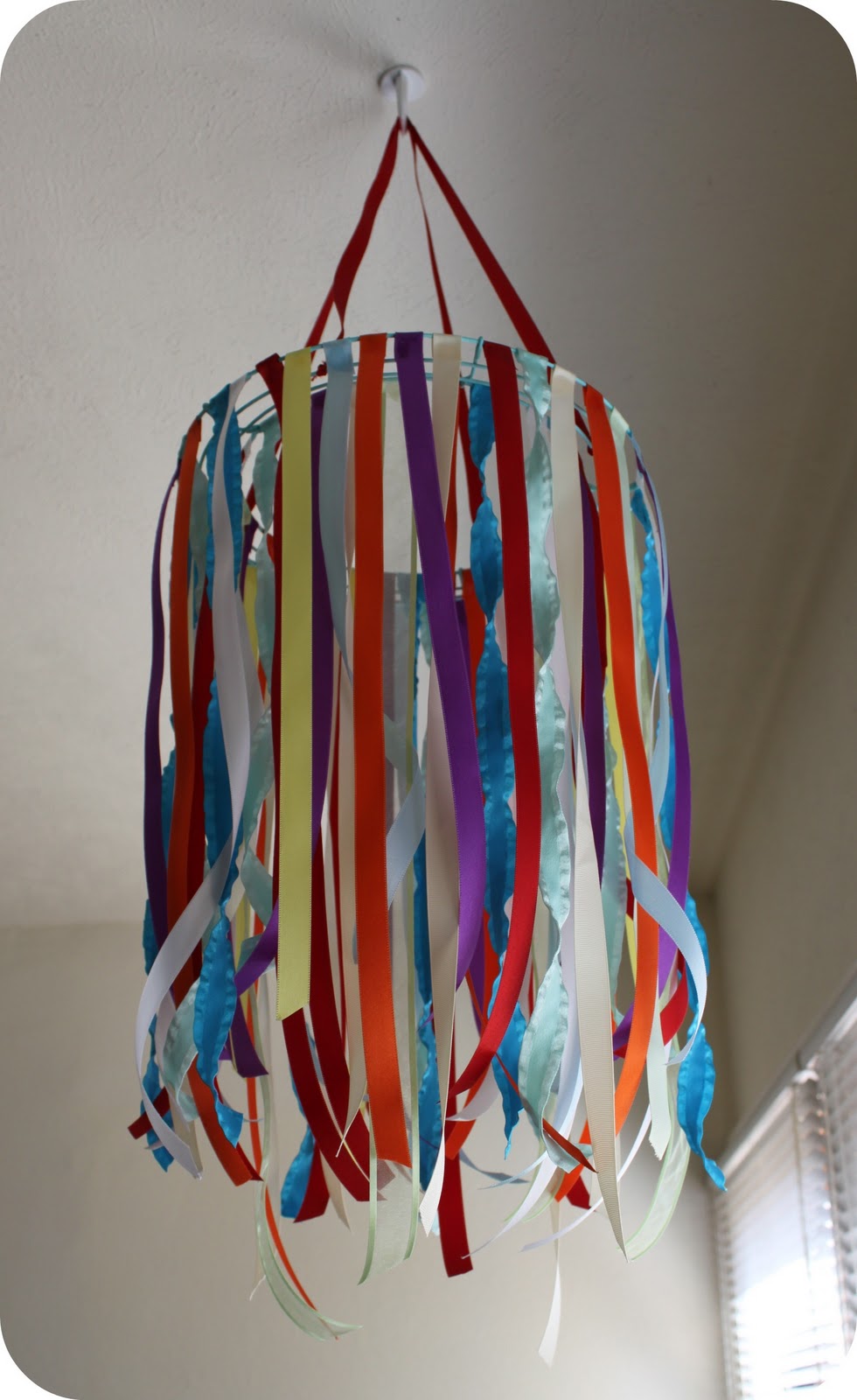 A Ribbon Mobile for Baby's Nursery Bare Feet on the Dashboard