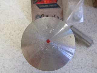 NOS piston with the letter K stamped on top - Yamaha LS3