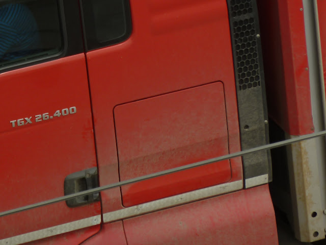 MAN TGX 26.400 6x2 Curtain Side Truck Red