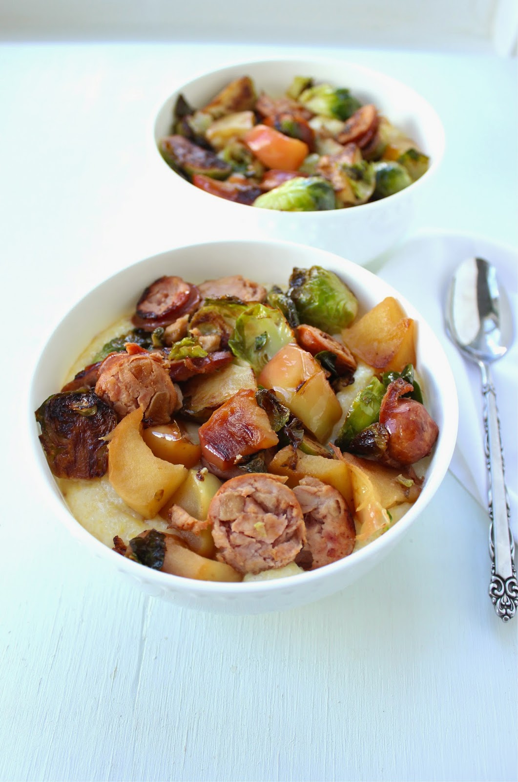 Stew or a Story Smoked Gruyere Grits with Chicken Sausage, Apples