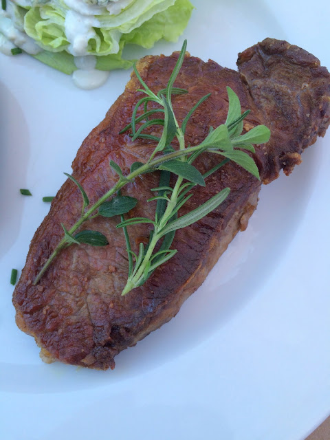 Perfectly cooked steak topped with fresh herbs | www.jacolynmurphy.com