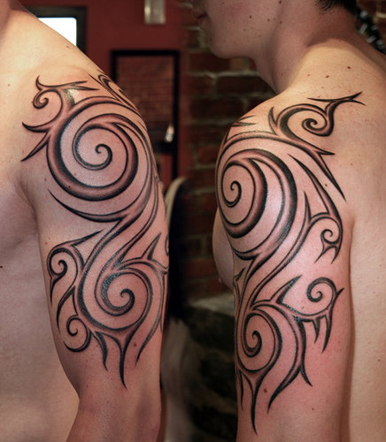 tribal tattoos for men shoulder and arm. The arm tattoos for men seem