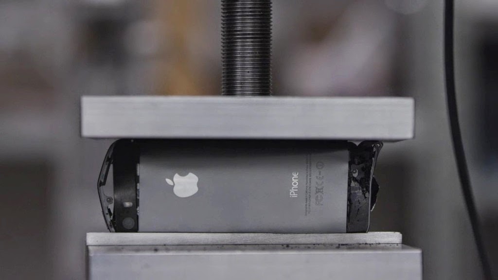 See The iPhone 5s Crushed By 40,000 Pounds Force in Slow Motion