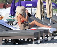 Victoria Silvstedt getting comfy on the sun bed