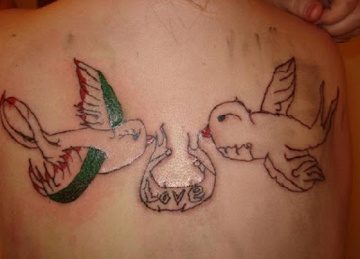 Worst Tattoo Ever? badly drawn swallows tattoo