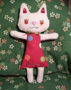 A pink cat doll....