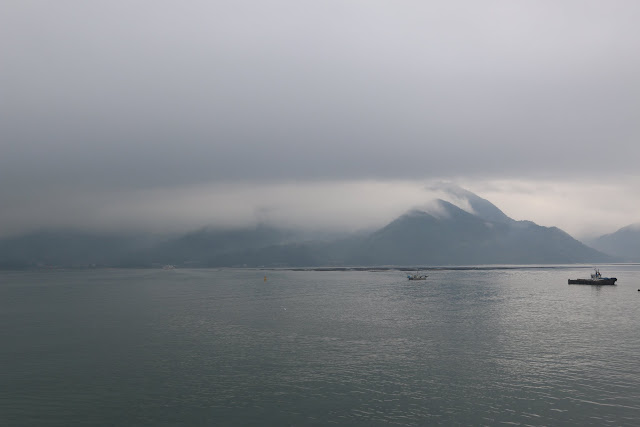It's cold and foggy after the rain from Hiroshima city to Miyajima Island for 30 minutes ferry ride in Japan It's cold and foggy after the rain from Hiroshima city to Miyajima Island for 30 minutes ferry ride in Japan
