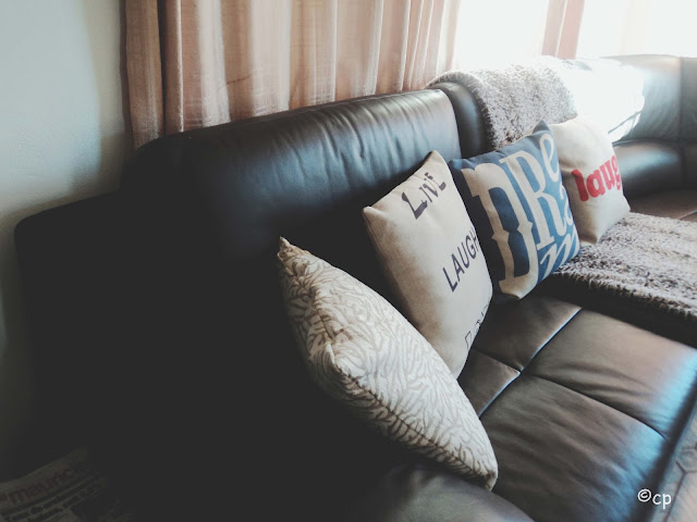Alternate view of the cushions adding some inspiration to the couch