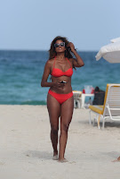 Claudia Jordan hot in  Red Bikini and black sunglasses