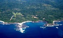 Aerial View of Beach, Town and Hills