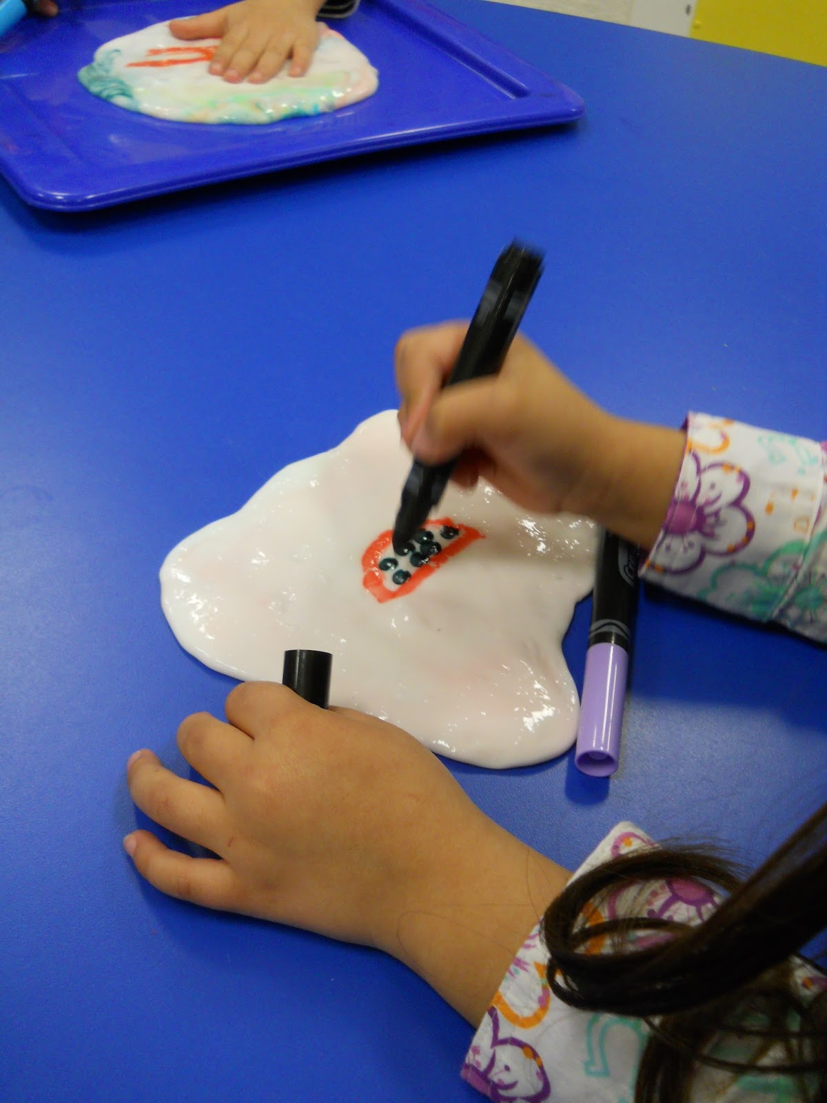 Learning and Teaching With Preschoolers Writing on Slime