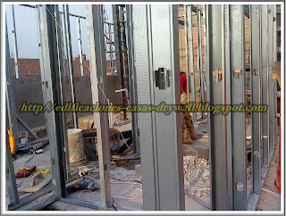 MMD construcciones: CASA DRYWALL AZOTEA / paredes drywall, estructuras