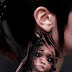 3D doll tattoo on whole neck