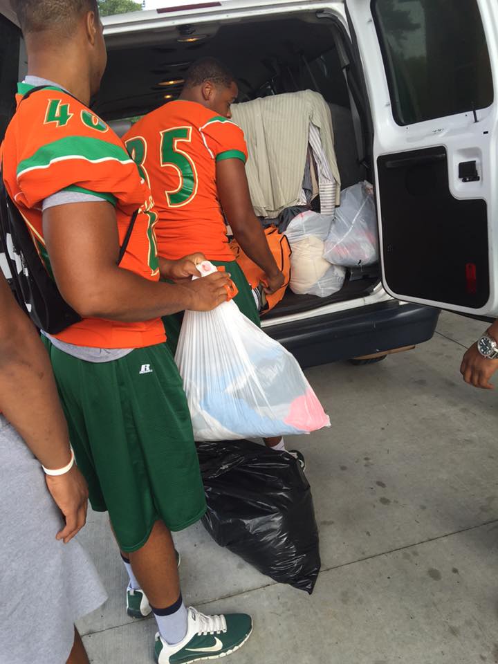 Rattler Nation Rattler football players donate clothing to needy