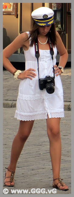 Girl walking in white summer dress