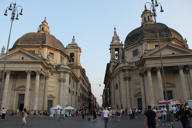 Two symmetrical churchese of Santa Maria dei Miracoli and Santa Maria in Montesanto in Piazza del Popolo in Rome, Italy Two symmetrical churchese of Santa Maria dei Miracoli and Santa Maria in Montesanto in Piazza del Popolo in Rome, Italy