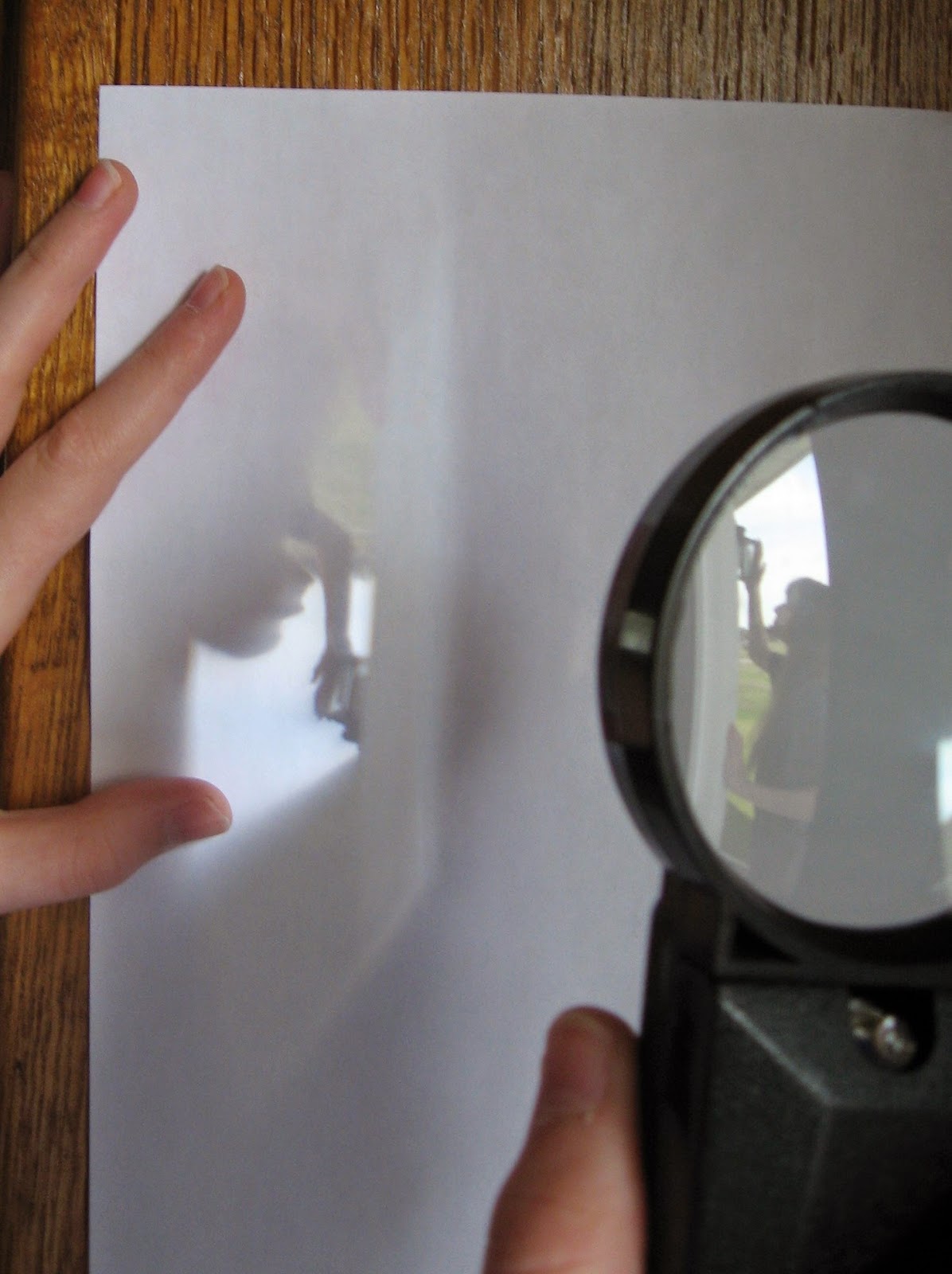 Almost Unschoolers Upside Down Images Through a Magnifying Glass