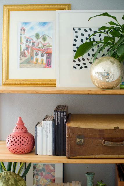 Styling a shelving unit that is both pretty and functional.