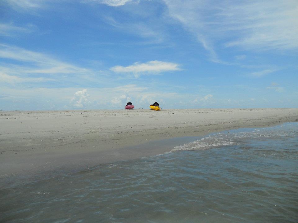 Go Outside Girl Kayaking the coast Topsail Island, NC