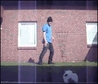 cat got kicked while street dancer was dancing
