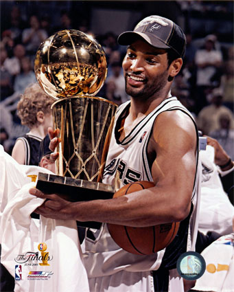 Houston Rockets forward Robert Horry carries the NBA Championship trophy  during a victory celebration following the Rockets 113-101 victory over the  Orlando Magic June 14, 1995, in Houston. The win gave the Rockets their  second straight NBA title. (AP