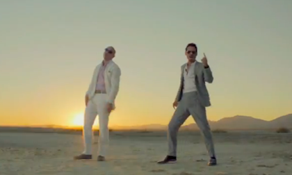 what s latest another rocking latest music video from pitbull rain over me featuring marc anthony is available now
