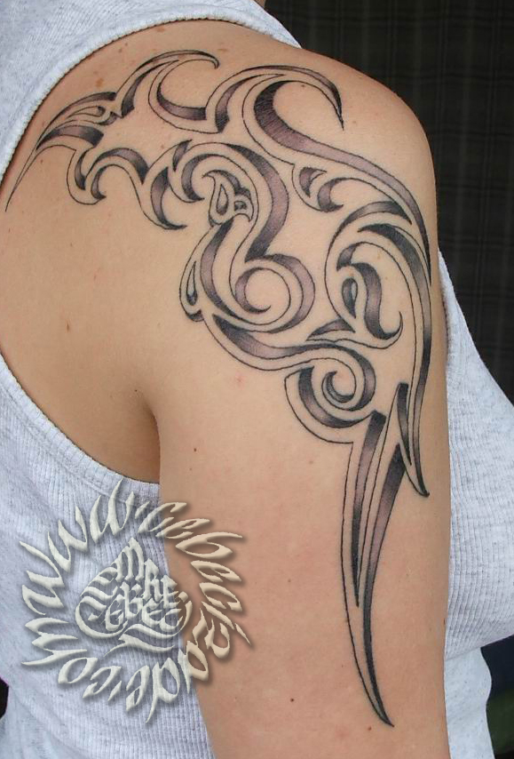 Hình xăm hoa văn cánh tay cho nữu