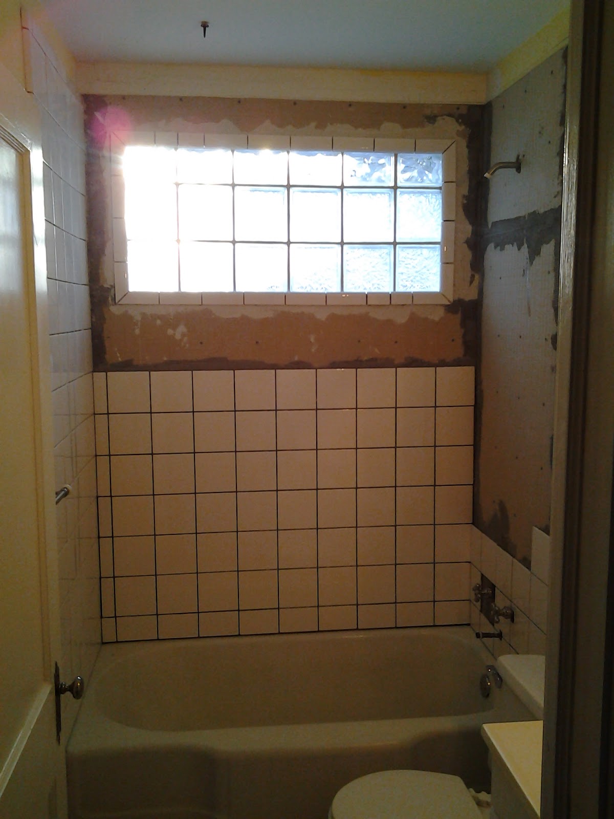 DammanWorks/Carpentry Glass Block Tile Tub Surround