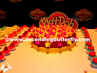 Play-Doh Plus used to create mini Play-Doh Cupcakes table display at Hasbro Toy Fair 2013 Event in New York City