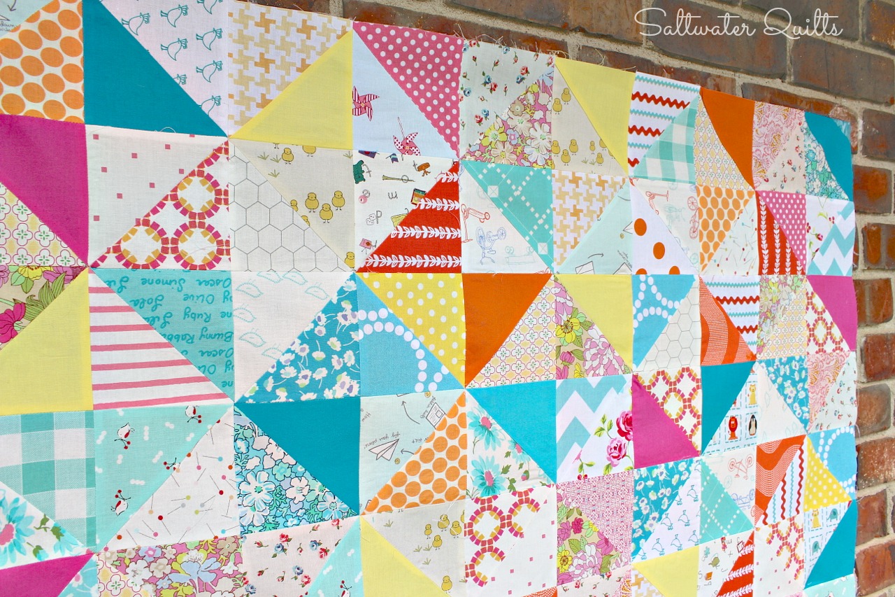 Saltwater Quilts Scrappy Happy Baby Quilt continues... (Made with Half Square Triangles)