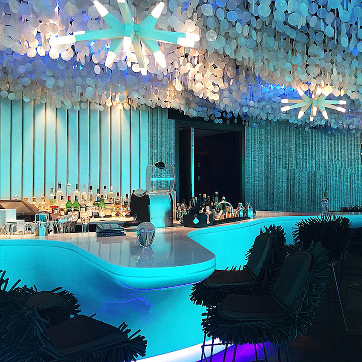 The center of the restaurant boast a clam-inspired bar, and the bar's lighting shifts throughout the day to match the tones of the sea. - This Is The Most Amazing Restaurant On Earth, Only It Isn’t ON The Earth. The center of the restaurant boast a clam-inspired bar, and the bar's lighting shifts throughout the day to match the tones of the sea. - This Is The Most Amazing Restaurant On Earth, Only It Isn’t ON The Earth.