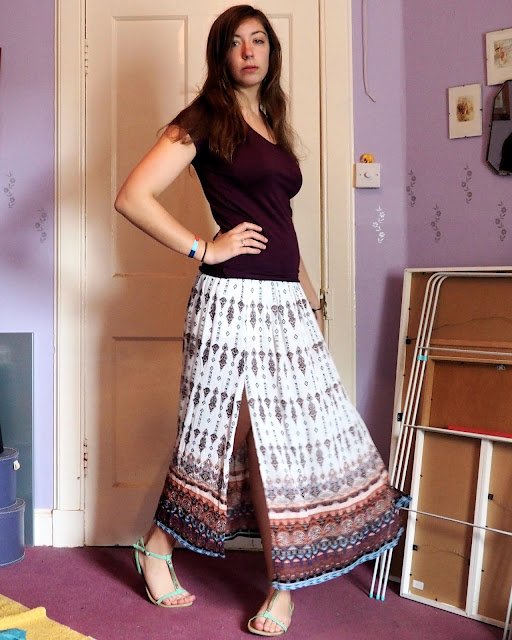 Ethereal | outfit of plain purple top, patterned maxi skirt and green strappy sandals