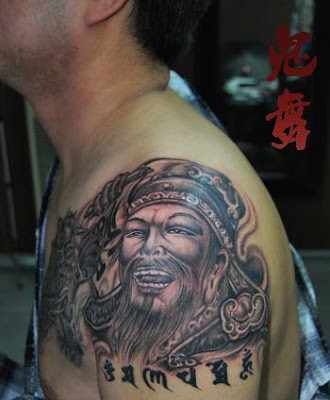 warrior tattoo design on the arm