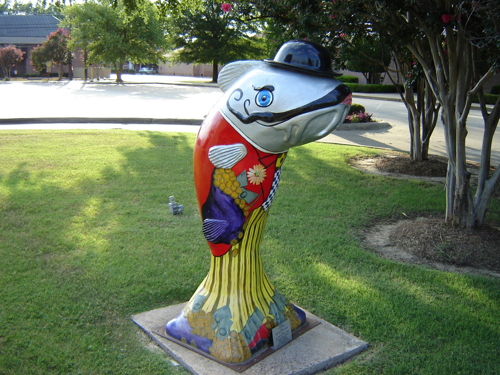 A Catholic Priest in Mississippi Catfish statues located all over