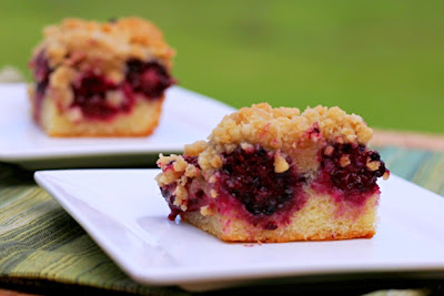 blackberry crumb cake on a white plate