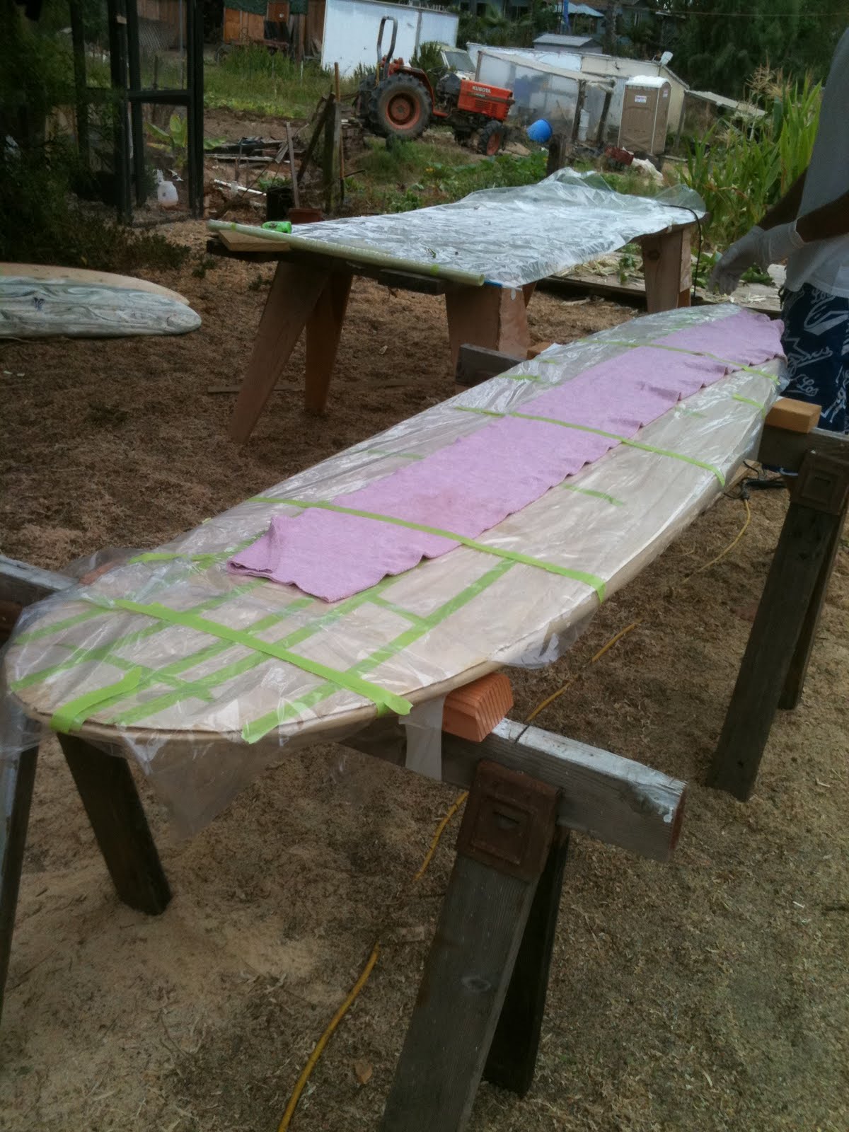 Wegener's Finless Frontier 7'6'' wood veneer, vacuum bag