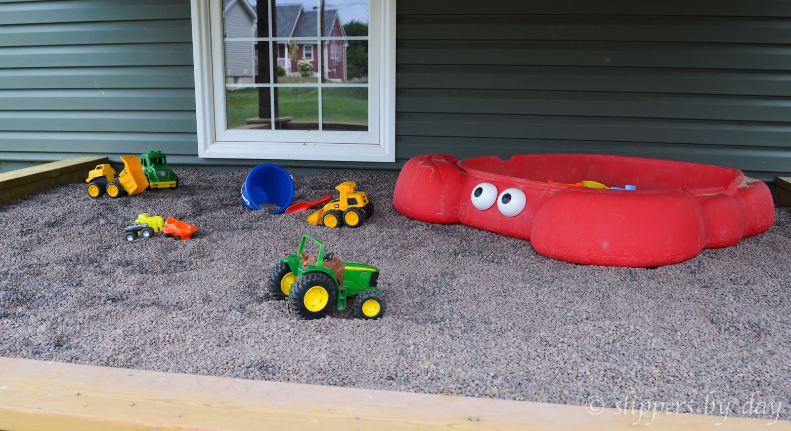 Slippers by Day DIY Sandbox Beneath a Raised Deck