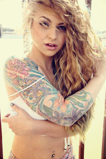 curly haired tattooed babe