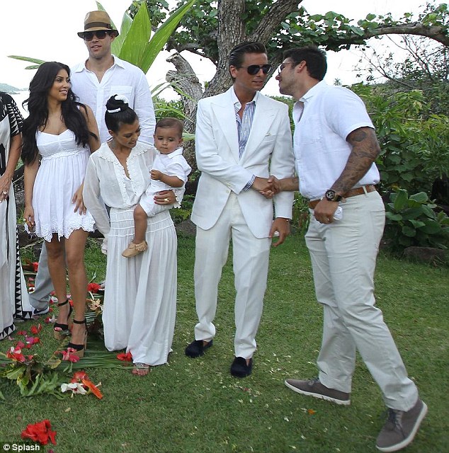 The bride... and the rest of the Kardashian family wore white Bruce