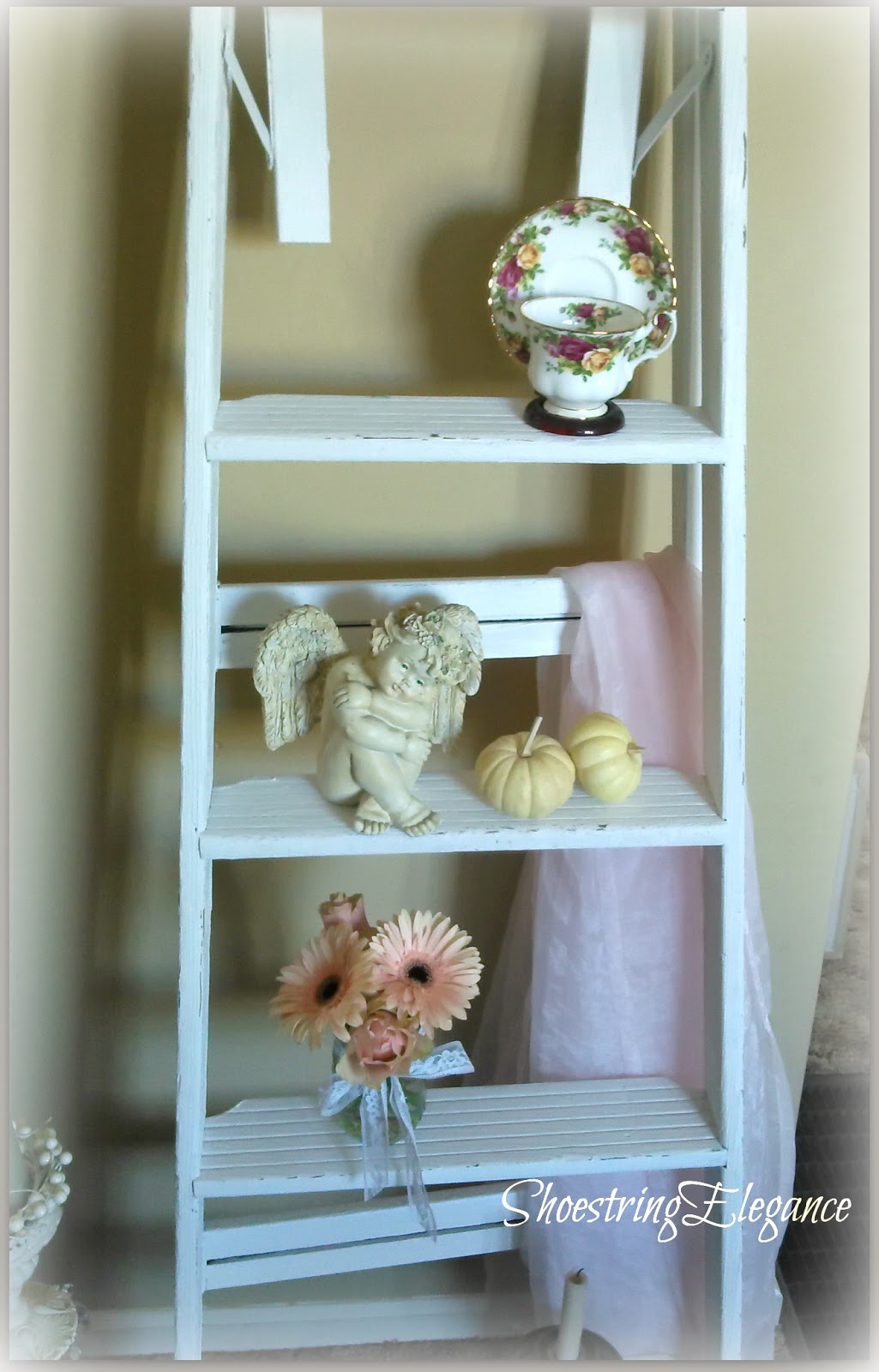 Shoestring Elegance Ladder DisplayDone with Chalk Paint, Of course!