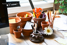Office junk organizer of pots and gears via Funky Junk Interiors