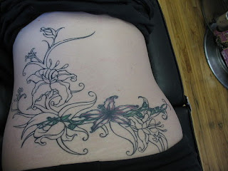 Tattooed Women with Flower Tattoos