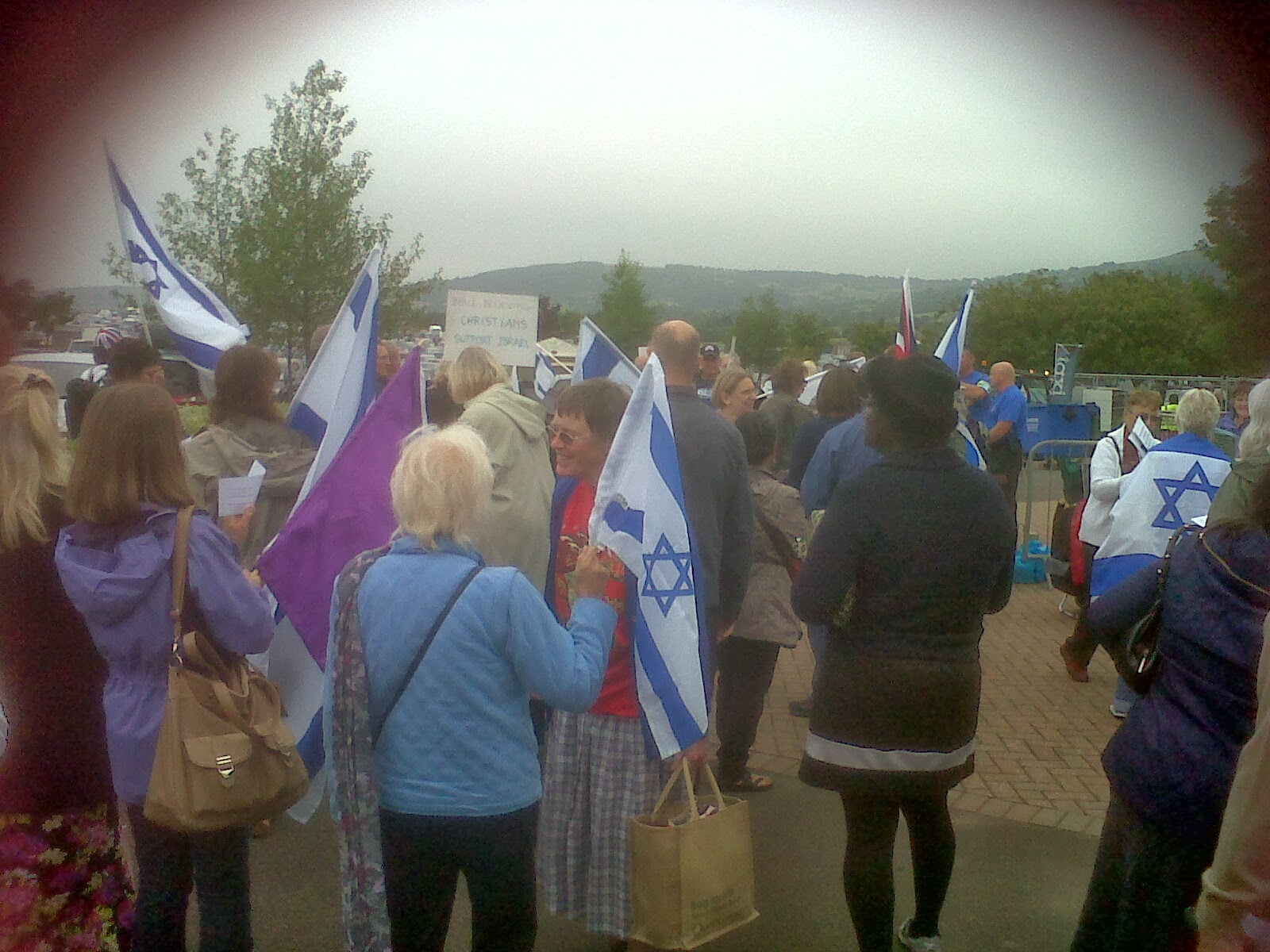 A PICTURE OF A GROUP OF CHRISTIANS SUPPORTING ISRAEL AT THE ANTI SEMITE GREENBELT EVENT.