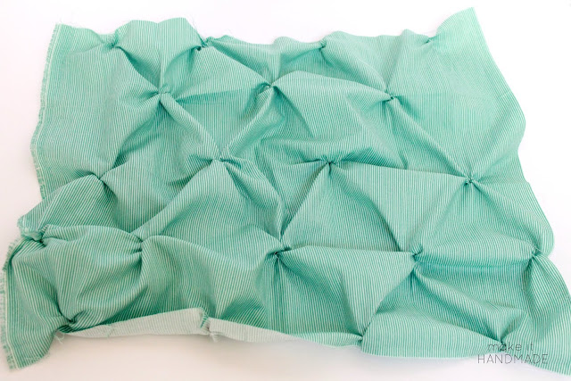 The Twist Pillow-- Free tutorial for a fun smocked throw pillow. | www.makeithandmade.com