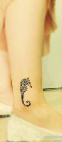 Seahorse tattoo on the leg